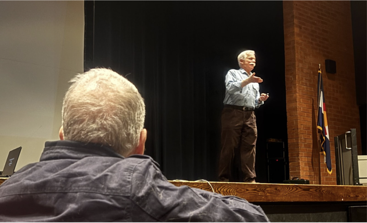 Jay Dickman speaking at Cherry Creek HS. 